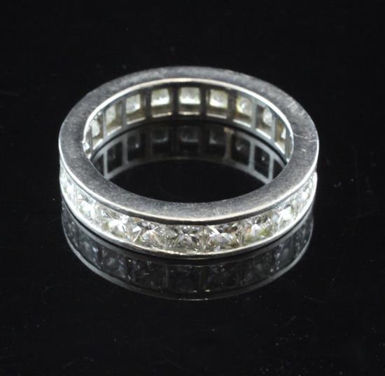 A platinum and princess cut diamond set full eternity ring, size N.